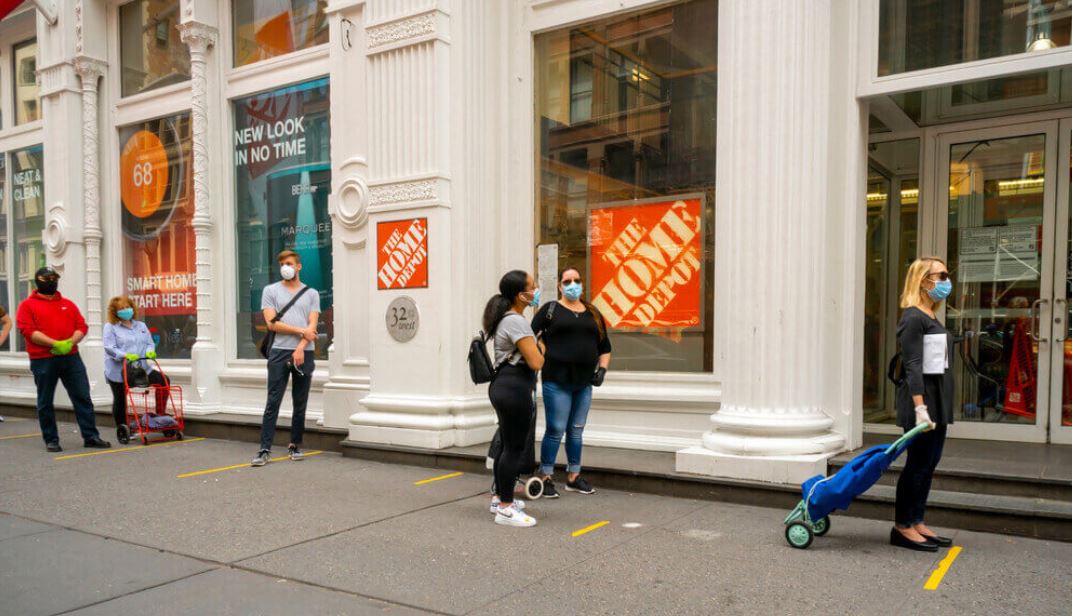 US Consume confidence People practice social distancing protocols as they wait to enter a Home Depot store in Chelsea